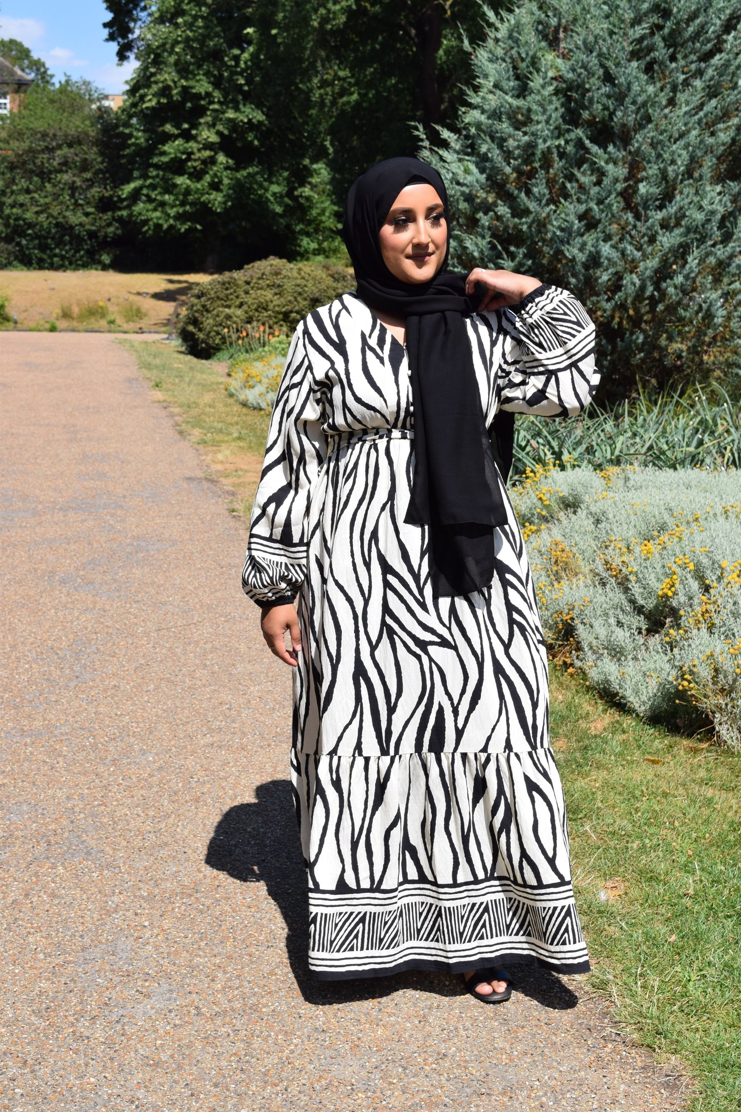 Modest Maxi dress in a tiered Linen Sahara print in Black