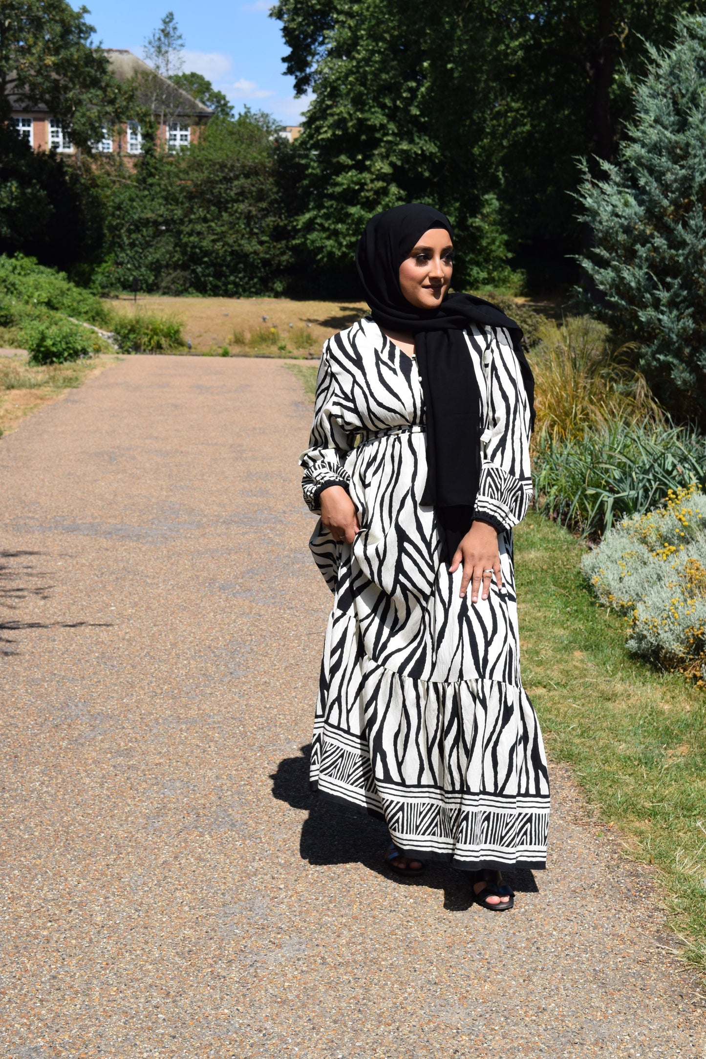 Modest Maxi dress in a tiered Linen Sahara print in Black