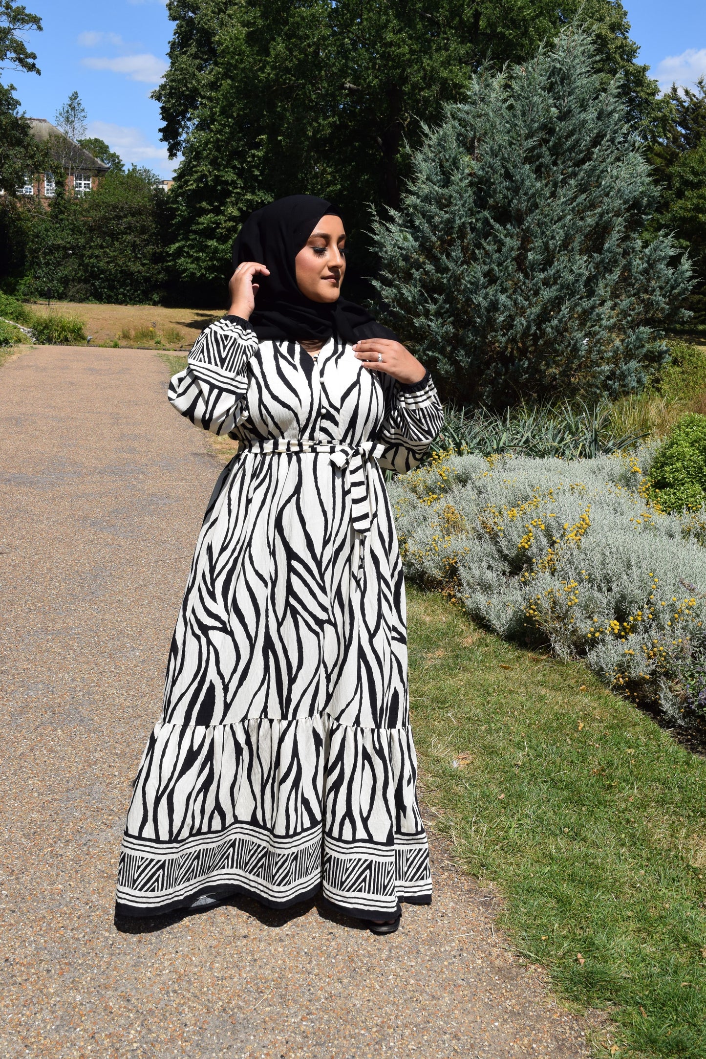 Modest Maxi dress in a tiered Linen Sahara print in Black
