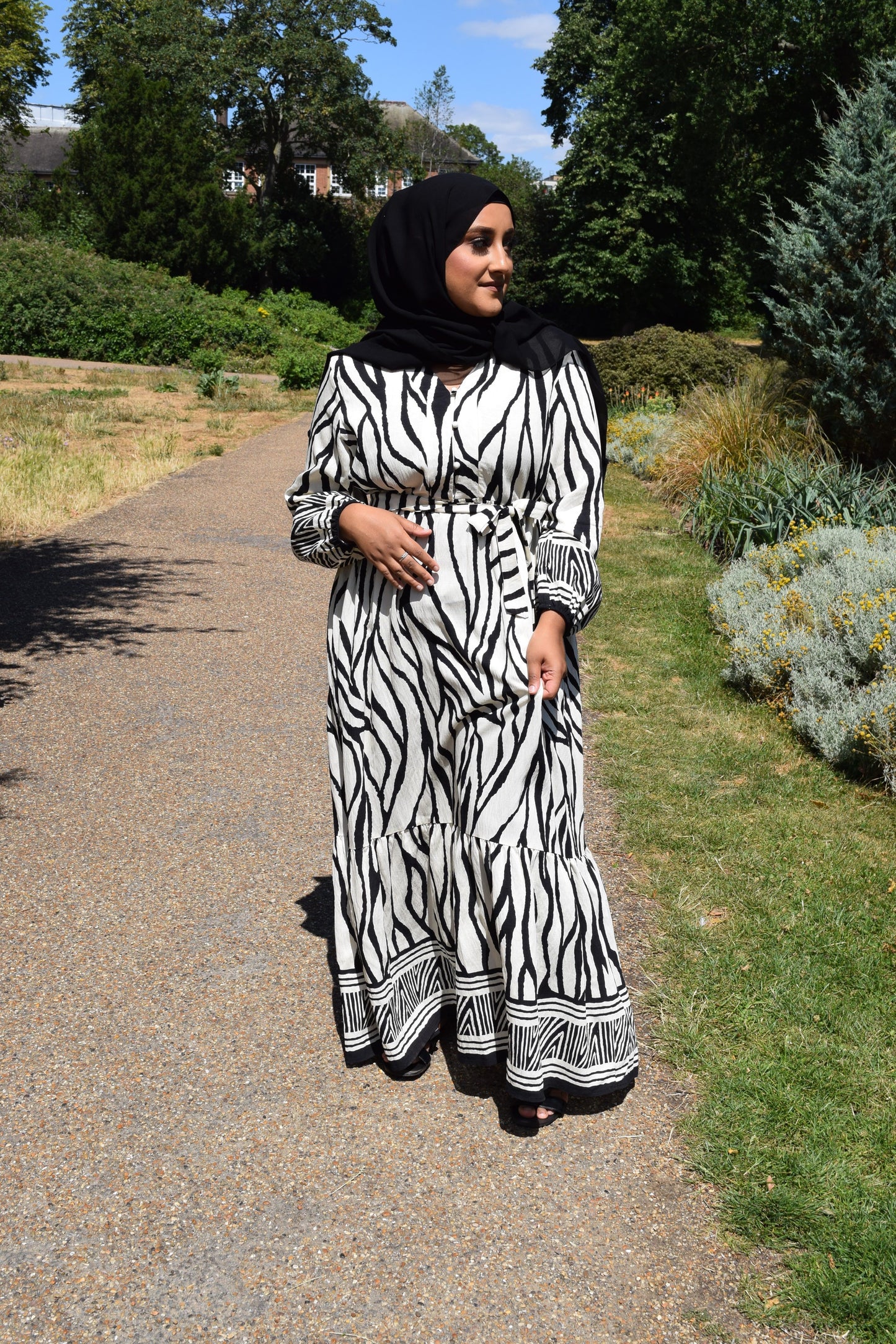 Modest Maxi dress in a tiered Linen Sahara print in Black