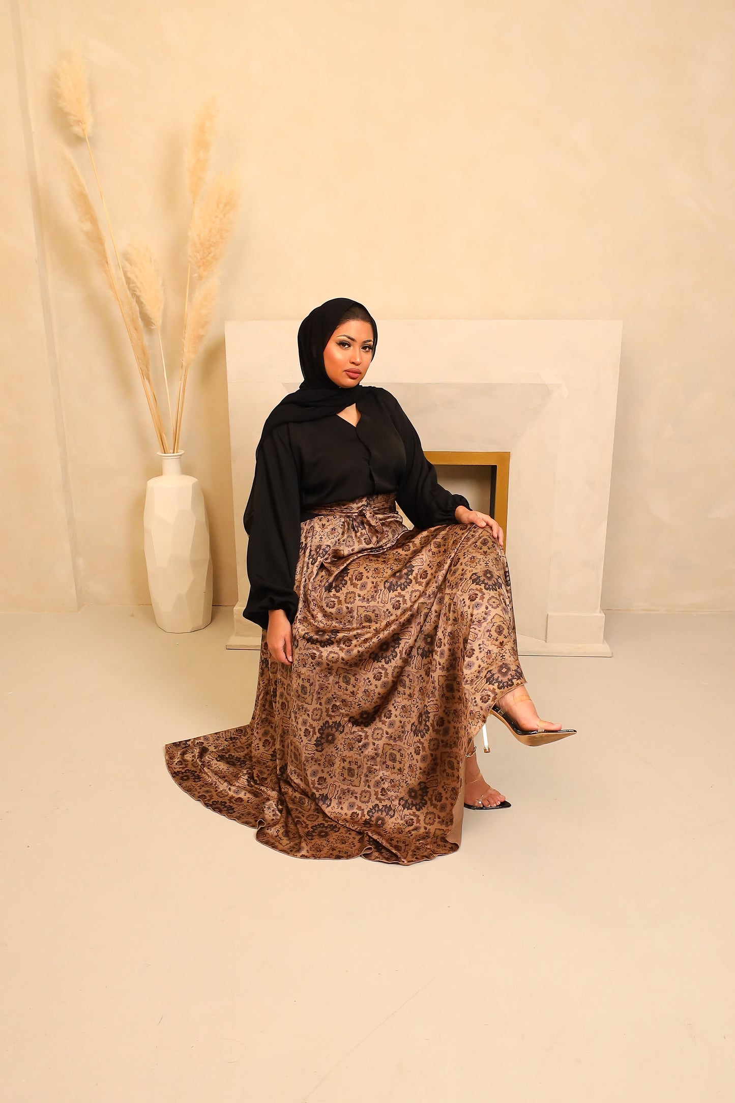 Amal flared Abaya in a black Nidah and Persian floral print