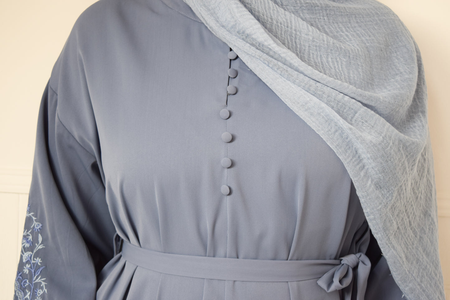 Sofia Long plain abaya dress with long sleeves, pockets and embroidery detail Powder Blue